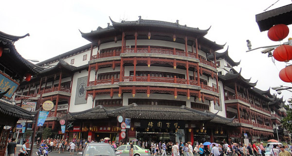 A pedestrian walks past an Ochirly store in Shanghai, China, 13